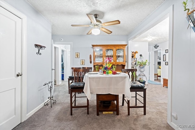 322 St Matthew St, Petersburg, VA 23803 - dining room featuring a textured ceiling, carpet floors, and a ceiling fan