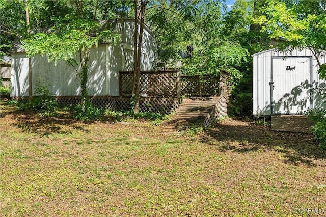 9120 Pepperidge Rd, Chesterfield, VA 23236 - view of green lawn with an outdoor structure and a storage unit