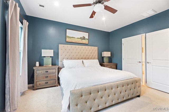 bedroom with carpet and a ceiling fan