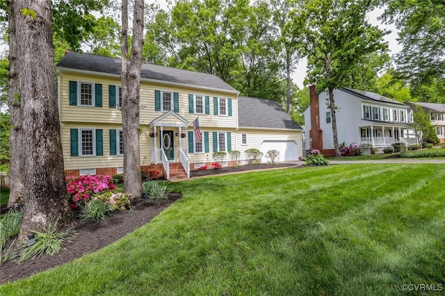 4606 Oak Hollow Rd, Chester, VA 23831 - colonial house with a front lawn and an attached garage