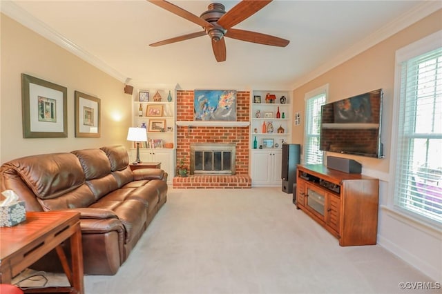 4606 Oak Hollow Rd, Chester, VA 23831 - living area featuring ceiling fan, crown molding, built in shelves, light colored carpet, and a fireplace