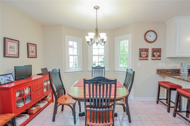4606 Oak Hollow Rd, Chester, VA 23831 - dining space featuring a chandelier and light tile patterned flooring