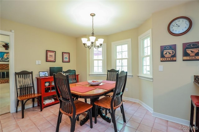 4606 Oak Hollow Rd, Chester, VA 23831 - dining area with a chandelier and light tile patterned floors