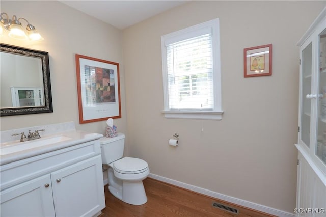 4606 Oak Hollow Rd, Chester, VA 23831 - bathroom featuring vanity and wood finished floors