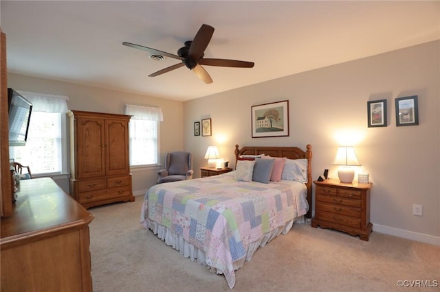 4606 Oak Hollow Rd, Chester, VA 23831 - bedroom with light colored carpet and a ceiling fan