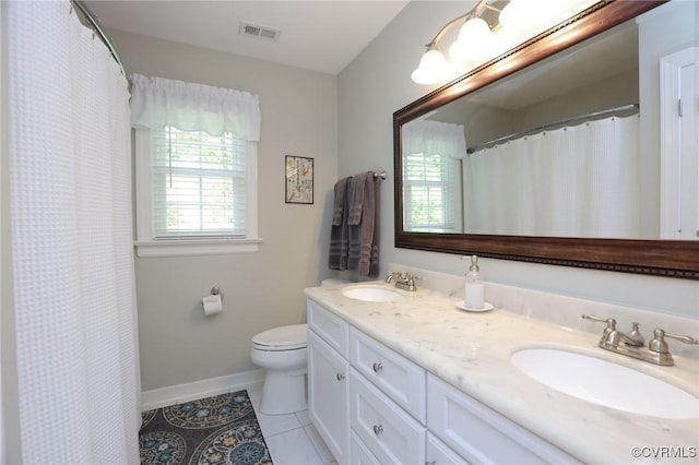 4606 Oak Hollow Rd, Chester, VA 23831 - bathroom featuring double vanity, tile patterned floors, and a shower with shower curtain