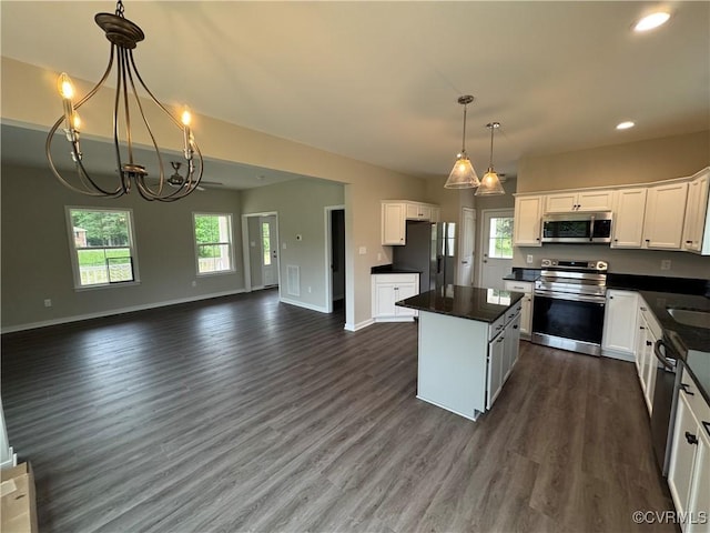48 Cedar Hill Rd, Mineral, VA 23117 - kitchen with appliances with stainless steel finishes, dark countertops, a kitchen island, open floor plan, and a chandelier