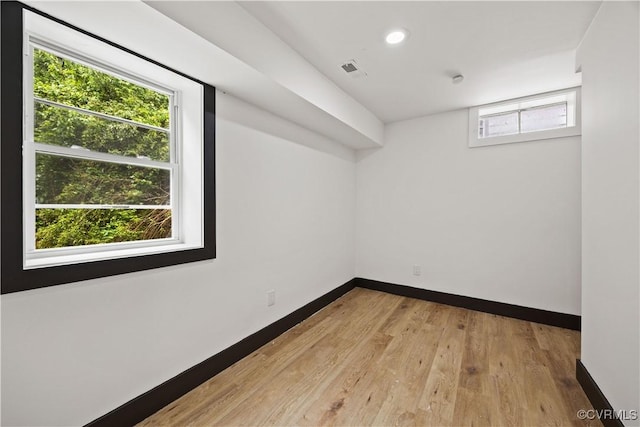 bonus room featuring baseboards, light wood-type flooring, and recessed lighting