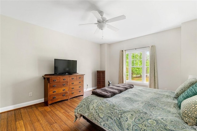 1845 Lower Mill Rd, Powhatan, VA 23139 - bedroom featuring baseboards, hardwood / wood-style floors, and a ceiling fan