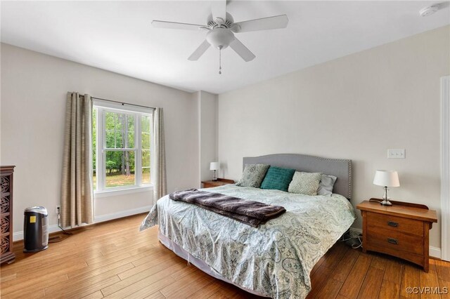 1845 Lower Mill Rd, Powhatan, VA 23139 - bedroom with wood-type flooring, baseboards, and ceiling fan