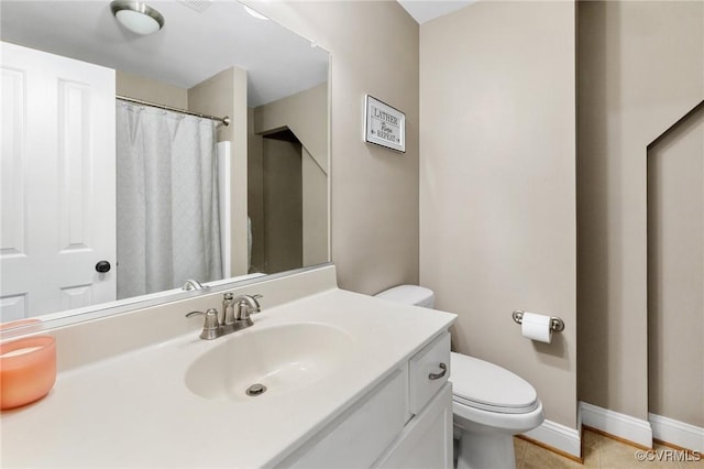 1845 Lower Mill Rd, Powhatan, VA 23139 - full bath with toilet, baseboards, vanity, and tile patterned floors
