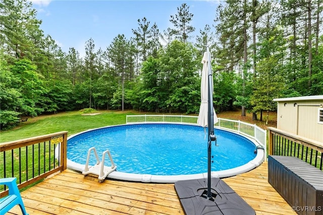 1845 Lower Mill Rd, Powhatan, VA 23139 - outdoor pool featuring a deck, a yard, and view of wooded area