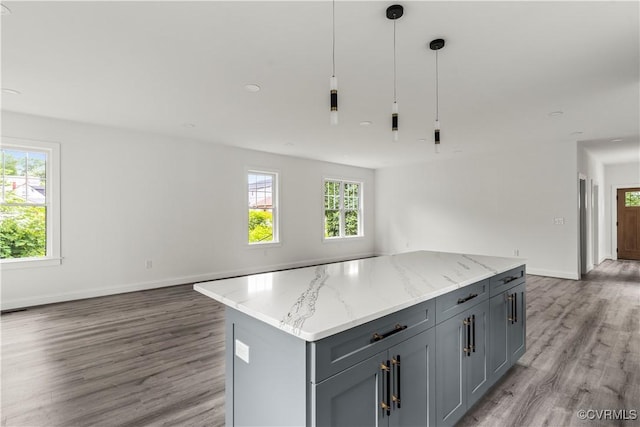 2001 Monteiro Ave, Richmond, VA 23222 - kitchen featuring open floor plan, gray cabinetry, and light wood-type flooring