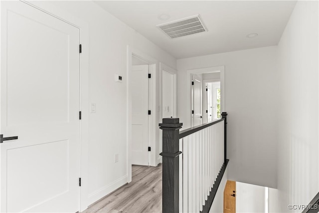 2001 Monteiro Ave, Richmond, VA 23222 - hall featuring an upstairs landing, light wood-style flooring, and baseboards