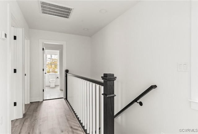 2001 Monteiro Ave, Richmond, VA 23222 - hall featuring an upstairs landing, wood finished floors, and baseboards