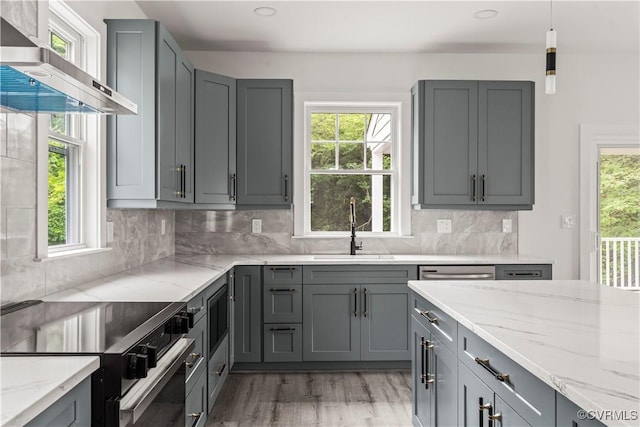 2001 Monteiro Ave, Richmond, VA 23222 - kitchen with wall chimney range hood, a sink, electric stove, gray cabinetry, and recessed lighting