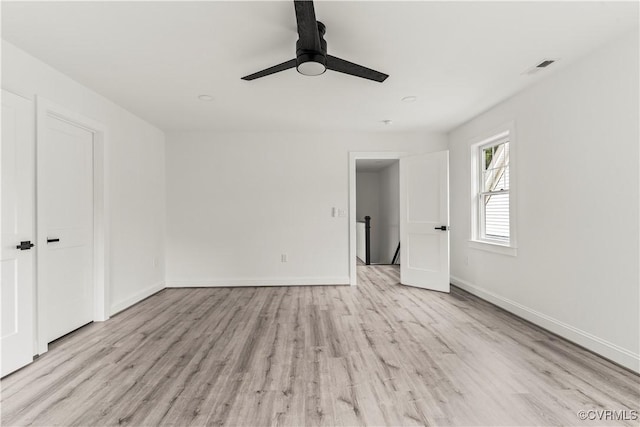 2001 Monteiro Ave, Richmond, VA 23222 - unfurnished bedroom with light wood-type flooring, baseboards, and ceiling fan