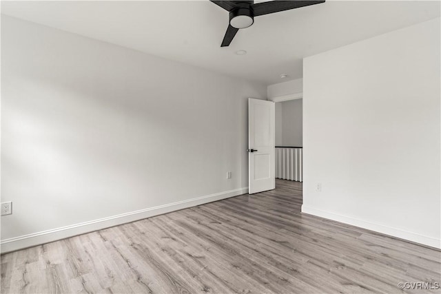 2001 Monteiro Ave, Richmond, VA 23222 - unfurnished room with wood finished floors, a ceiling fan, and baseboards
