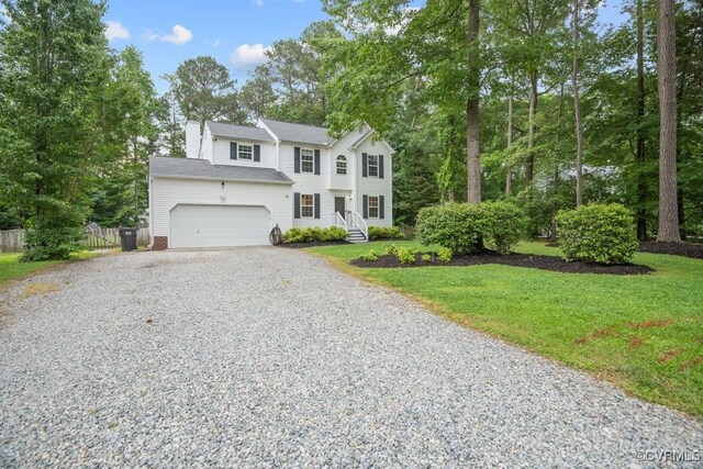 3190 Magnolia Woods Ter, New Kent, VA 23141 - view of front facade featuring driveway and a garage