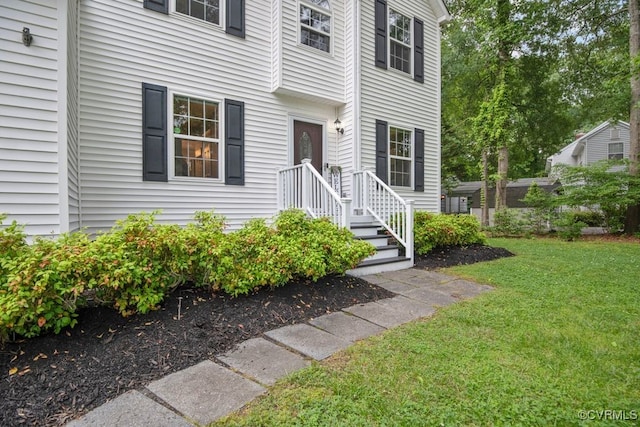 3190 Magnolia Woods Ter, New Kent, VA 23141 - doorway to property featuring a lawn
