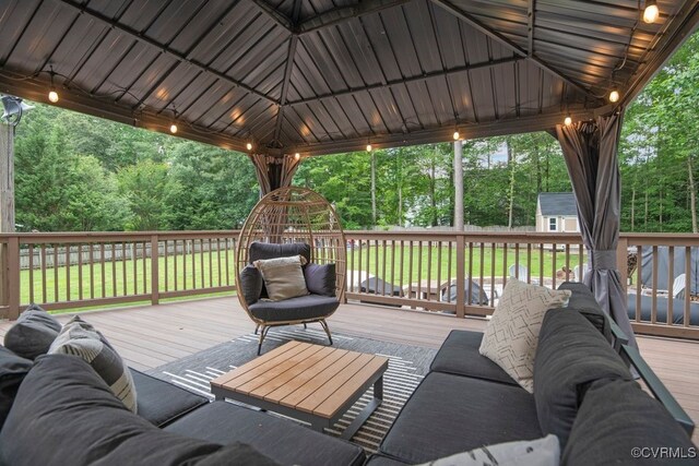 3190 Magnolia Woods Ter, New Kent, VA 23141 - deck featuring a gazebo, a lawn, an outdoor structure, and view of scattered trees