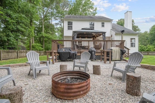 3190 Magnolia Woods Ter, New Kent, VA 23141 - view of patio with an outdoor fire pit, a gazebo, fence, and a grill