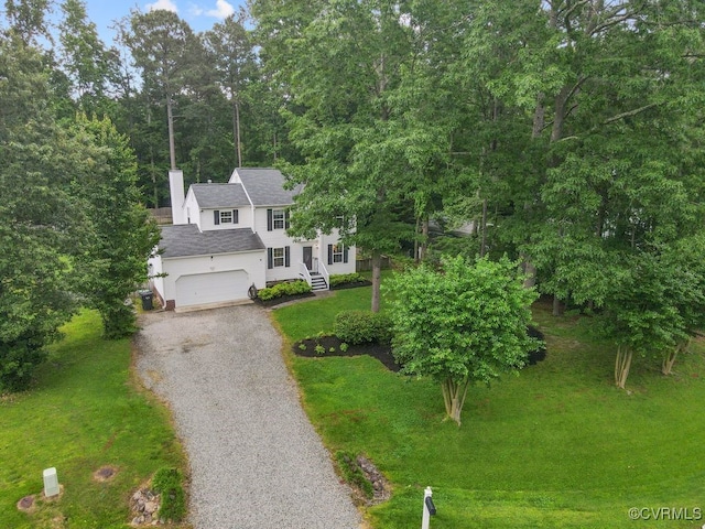 3190 Magnolia Woods Ter, New Kent, VA 23141 - view of front of property with driveway, a shingled roof, a chimney, a front yard, and a garage