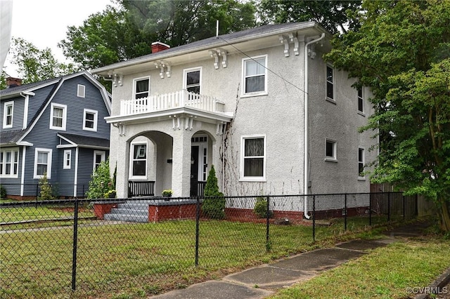 1024 W S Blvd, Petersburg, VA 23805 - italianate house with a balcony, a chimney, stucco siding, and covered porch