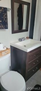 1024 W S Blvd, Petersburg, VA 23805 - bathroom with vanity and toilet