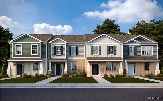 6012 Banyan Ln, Chesterfield, VA 23234 - view of front facade featuring brick siding and a front lawn