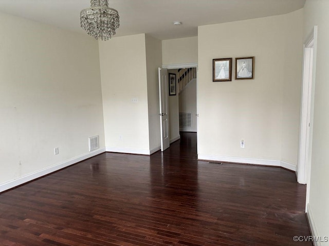1919 Hounslow Ln, Manakin Sabot, VA 23103 - empty room featuring dark wood-type flooring, a chandelier, baseboards, and a smoke detector