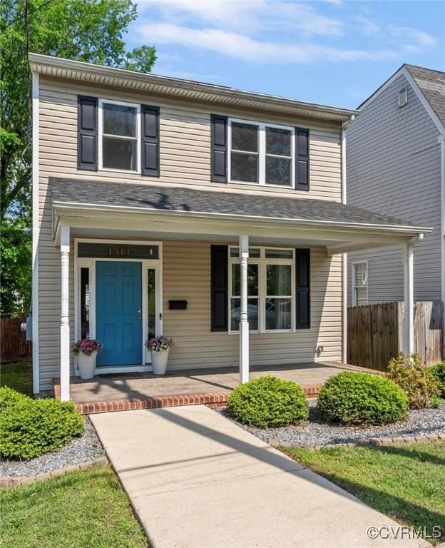 1514 N 23rd St, Richmond, VA 23223 - traditional home featuring covered porch and fence