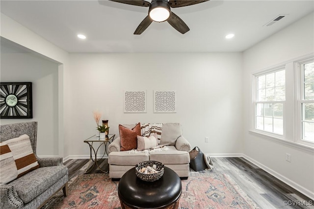 sitting room featuring wood finished floors, baseboards, ceiling fan, and recessed lighting
