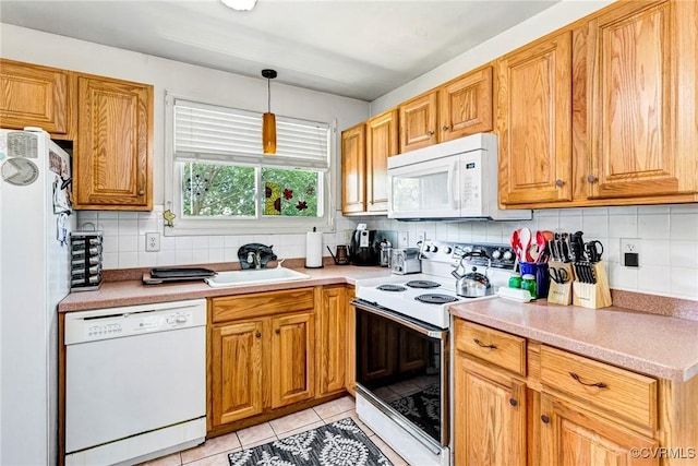 9301 Carlway Ct, Henrico, VA 23228 - kitchen with white appliances, tasteful backsplash, a sink, light tile patterned flooring, and light countertops
