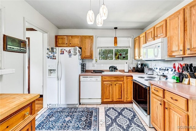 9301 Carlway Ct, Henrico, VA 23228 - kitchen with white appliances, tasteful backsplash, a sink, decorative light fixtures, and light tile patterned floors