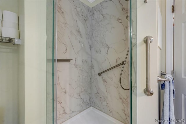 10402 Freewelcome Ln, Gloucester, VA 23050 - bathroom featuring a marble finish shower