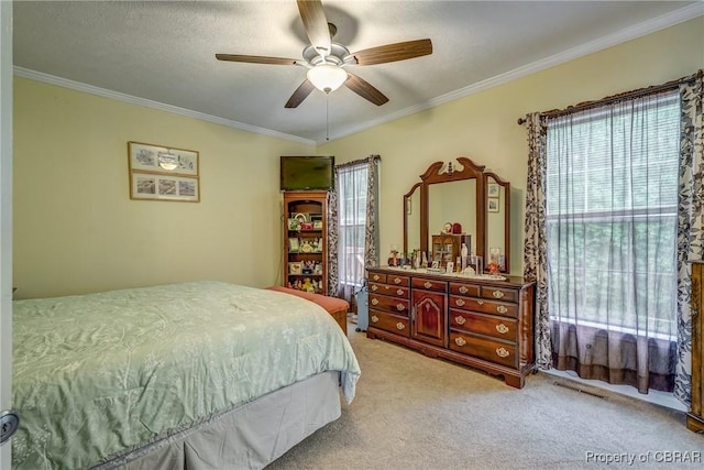10402 Freewelcome Ln, Gloucester, VA 23050 - bedroom featuring light colored carpet, crown molding, and ceiling fan