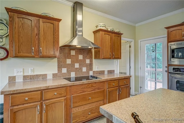 10402 Freewelcome Ln, Gloucester, VA 23050 - kitchen featuring wall chimney exhaust hood, stainless steel appliances, tasteful backsplash, light countertops, and ornamental molding