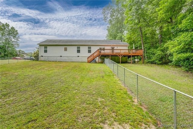 10402 Freewelcome Ln, Gloucester, VA 23050 - rear view of house featuring stairway, a wooden deck, a fenced backyard, and crawl space