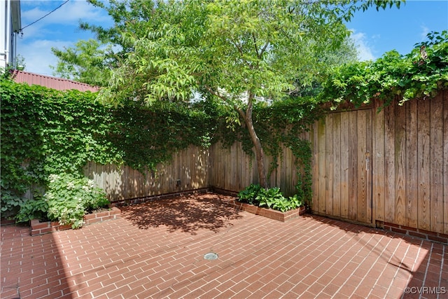 view of patio with a fenced backyard