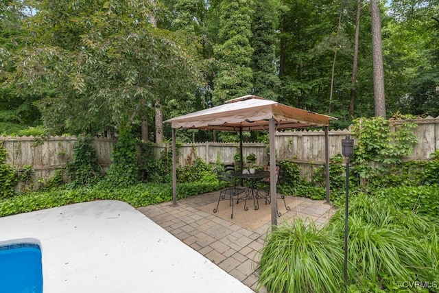 5904 Fox Crest Pl, Midlothian, VA 23112 - fenced backyard featuring a gazebo, a patio, and outdoor dining area