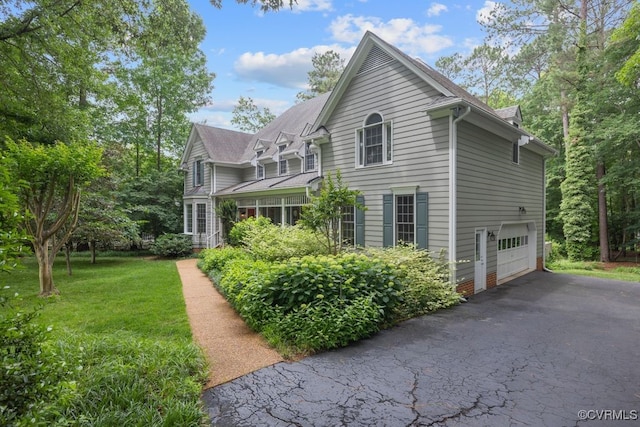 5904 Fox Crest Pl, Midlothian, VA 23112 - view of side of property with a garage, driveway, a yard, and a shingled roof