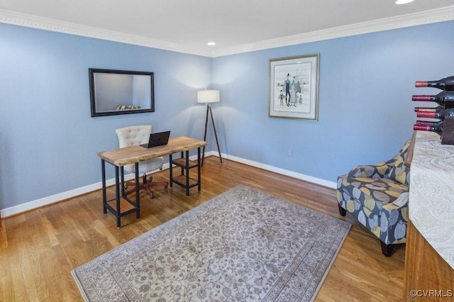 office space featuring baseboards, ornamental molding, wood finished floors, and recessed lighting