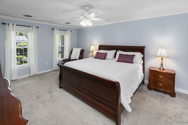 bedroom featuring light carpet, baseboards, ornamental molding, and ceiling fan