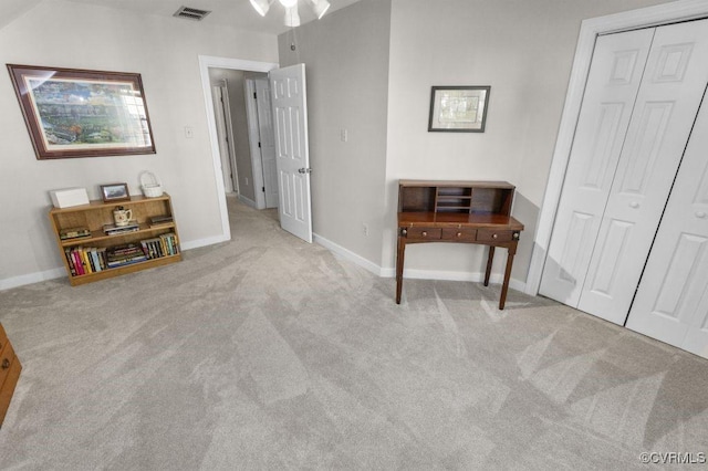 bedroom featuring carpet floors, baseboards, and a closet