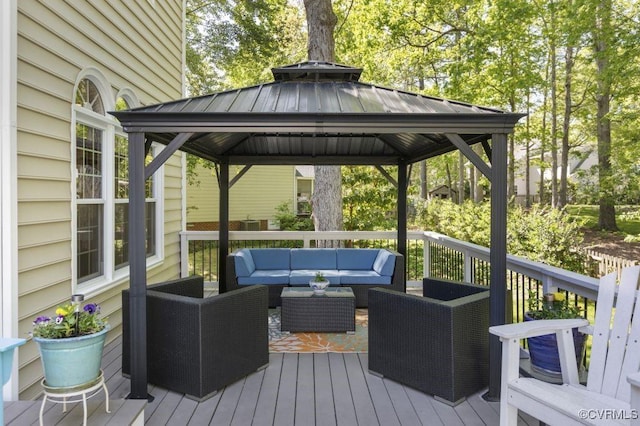 deck featuring an outdoor hangout area and a gazebo