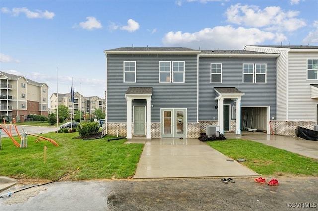 6008 Banyan Ln, Chesterfield, VA 23234 - multi unit property with central AC, a front lawn, a residential view, and brick siding