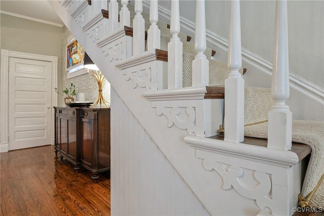 detailed view of wood finished floors and crown molding