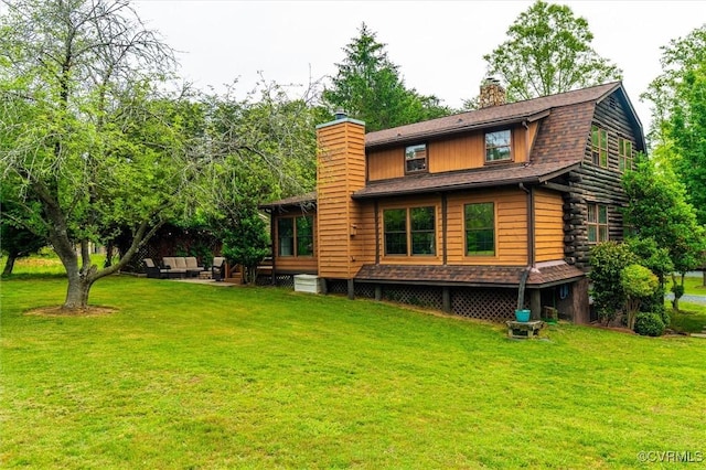 13 Bunker Blvd, Palmyra, VA 22963 - rear view of property featuring a chimney and a lawn