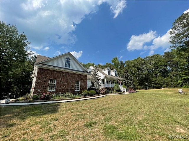 13300 Old Telegraph Rd, Providence Forge, VA 23140 - view of side of home with brick siding and a yard
